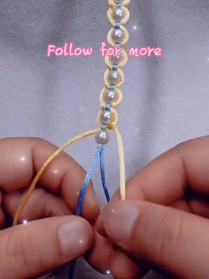 A post by @origamihero on TikTok caption: It’s too simple, have you learned? #weave #woven #bracelet #knittingrope #TodayILearned