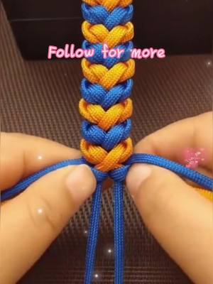 A post by @origamihero on TikTok caption: Have you learned it?  #weave #bracelet #MeTime #ColorSelector