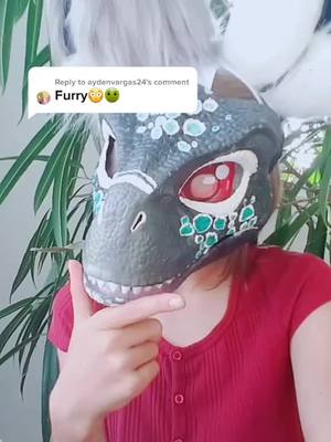 A post by @feline..fantasy on TikTok caption: Reply to @aydenvargas24  my acc is so dead- #furryfandom2020 #dinomask #fyp #foryourpage