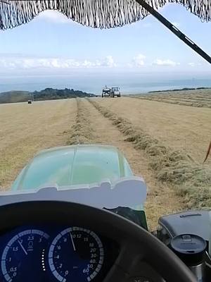 A post by @tomdown1 on TikTok caption: #haynob#johndeerelovers#northdevoncoast#contractinglife@neatey124