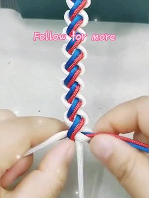 A post by @origamihero on TikTok caption: Is it beautiful? Have you learned it?  #weave #bracelet #ShowAndTell