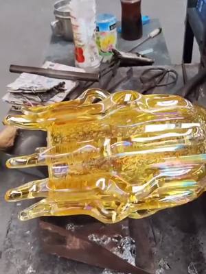 A post by @culture0102 on TikTok caption: #colored #glass #art #handmad