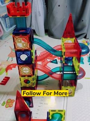 A post by @puzzlegame1 on TikTok caption: How to build a slide #building #buildingblocks #magnet