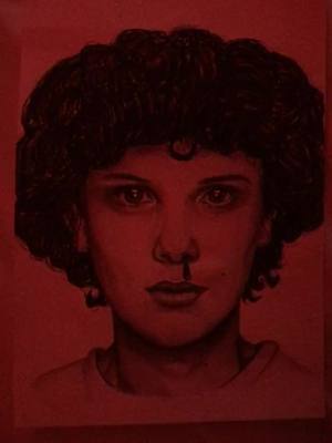 A post by @meggiemoo75 on TikTok caption: My drawing of 11 #11 #strangerthings #drawing #charcoal #eleven #arttiktok