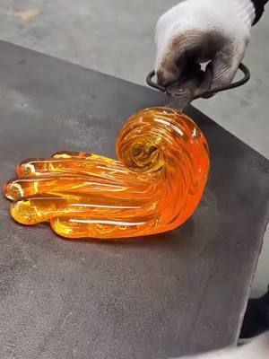 A post by @culture0102 on TikTok caption: #handmade #glass #art #artist #feet