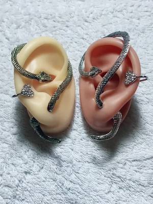 A post by @angelegauths on TikTok caption: Snake earrings..so cool