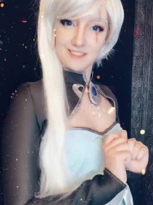 A post by @firecrackercosplay on TikTok caption: Have some old drafts!!! #weissschnee #weissschneecosplay #schneecosplay #rwby #rwbycosplay #roosterteeth