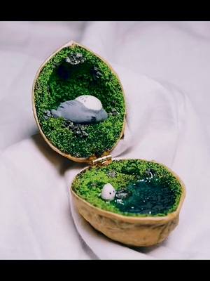 A post by @diyhandmade00 on TikTok caption: #totoro #resinart #epoxy #miniart #foryou #fyp