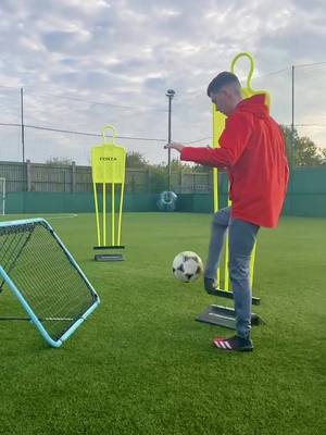 A post by @tnfreestyle on TikTok caption: How satisfying is this shot?🤩⚽️ #matchit #football #Soccer #fyp