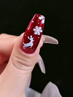 A post by @nailartist48 on TikTok caption: Christmas will coming #foryou #nail #nailtutorial #nailart #nailstamping #christmas #nailstampingkit