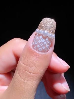 A post by @nailartistcacy on TikTok caption: Follow for more #foryou #nail #nailtutorial #nailart #nailstamping #christmas #nailstampingkit