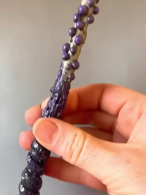 A post by @wandsandwizbies on TikTok caption: Reposting one of my most viewed and liked video! The Ursula wand. Should I restock this?? #wandsandwizbies #harrypotterwands #ursula #repost #1m #fyp