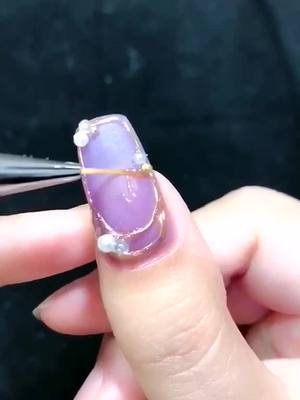 A post by @nailartistsworld on TikTok caption: purple. yes or no #nails #nailscheck #nailtutorial #nailsartvideos