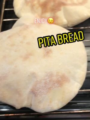 A post by @foodontiktok_ on TikTok caption: The best pita bread recipe. Its very easy and if you taste it, you never buy it from store. #pita #bread#homemade #sandwich #myrecipes