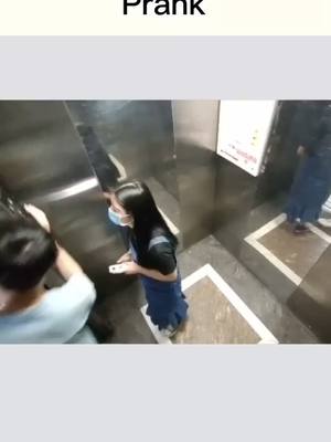 A post by @tkfunnylife on TikTok caption: Are you surprised or confused?#fy #fyp #elevatorprank #prank #funny #fun #joke