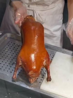 A post by @user2728523376712 on TikTok caption: This is a famous Chinese delicacy: Peking duck. #tiktok #foryourlike #foryoupage #food