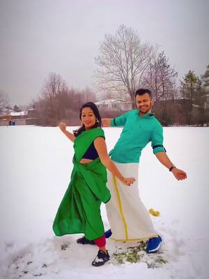 A post by @karthic_maruthi_das on TikTok caption: Banaras pattu ketti ❣️ @bettinageorge22 #canadianmallus #toronto #friends #tamilsong #tamil #winter #snow #dance #tiktok #mund #kerala #kuthudance