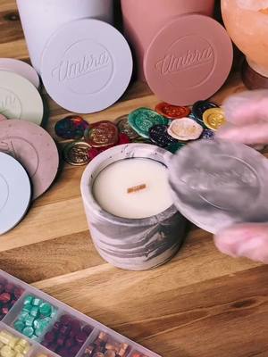 A post by @umbraapothecary on TikTok caption: Introducing our new marble color! ⚫️⚪️ #candletok #candlemaking #candlebusiness #waxseal #waxstamp