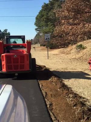 A post by @trifirma05 on TikTok caption: Road shoulder ready #excavationlife #homemade #fyp #dirtwork #construction #mississippi