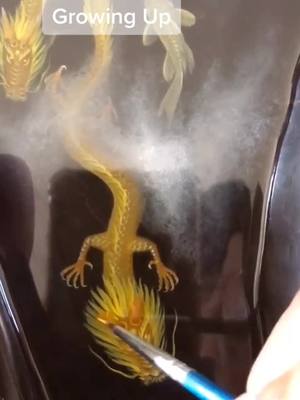 A post by @resinpainting on TikTok caption: #resin #painting #foryoupage #fyp #myart #koi #dragon