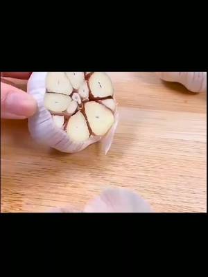 A post by @deliciousfood29 on TikTok caption: Roasted garlic#food