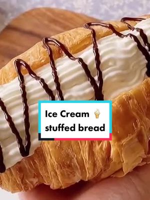 A post by @raiscuisine on TikTok caption: Bread 🥖 stuffed with 🍦, comment if you’d have a bit #bread #icecream #snack #dessert