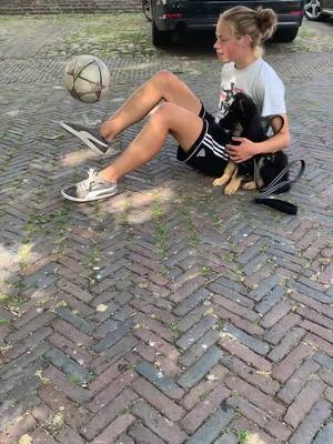 A post by @laurafreestyle_ on TikTok caption: Throwback, do you like dogs? 🐶⚽️ #freestylefootball #fyp #fy #skills #foryoupage #roadto100k #dogsoftiktok