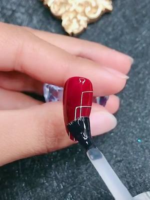 A post by @manicurist7 on TikTok caption: Nail tutorial #rednail #DIY #NHLFaceOff #i wante to be popular #hand #stident #sunny