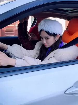 A post by @wenchsns on TikTok caption: Although l just got my driver’s license, it’s not like this #beautifulgirl #longhair #fashion #funny #chinesegirl #automobile