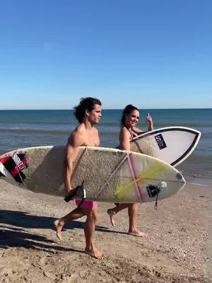 A post by @betsyperdomofit on TikTok caption: 💦💦 #surf #couple #couplegoals