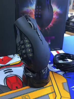 A post by @pydun on TikTok caption: A close look of Razer Naga #wirelessmouse #gamingmouse #tech #gadget #razer #foryou #fyp