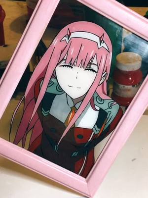 A post by @doritospizzerola222 on TikTok caption: #zerotwo #darlinginthefranxx #anime #pintura #art #fyp #parati #shadowbanned #blowthisup #glasspainting #enjoy #pain #trending #web