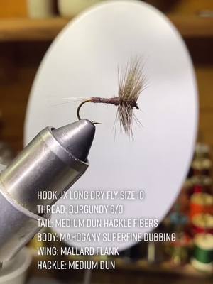 A post by @hunter_f18 on TikTok caption: Isonychia Dry Fly #FlyTying #FlyFishing