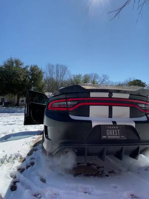 A post by @simon_the4th on TikTok caption: Little cold start in snowy Texas weather ❄️ #fyp #coldstart #mopar #scatpack #foryou #dodge #car #cars