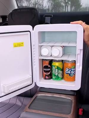 A post by @efunlifetip1 on TikTok caption: Large capacity hot and cold car refrigerator#fyp #foryou #LifeHack #lifetip #artifact #usefull #car