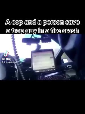 A post by @thatkidname on TikTok caption: Not all cops are bad💙❤️ #cop #saves #guy #trap #in #firecrash #fyp