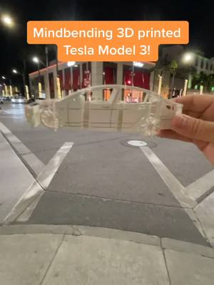 A post by @lacarspotter on TikTok caption: 3d printed #tesla #model3 #teslamodel3 #mitsubishievo #evox #foryou #fyp #cars #art #beverlyhills #rodeodrive #3dprinting #3dart #foryoupage ￼