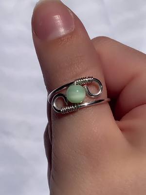 A post by @artbymandy on TikTok caption: one of my new favs!! restock soon!! follow my ig for updates!! #ring #rings #SmallBusiness #handmade #jewelry #fyp #foryou #foryoupage