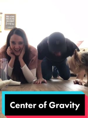 A post by @michaelandchristine on TikTok caption: They say the center of gravity is different from Men to Women. Try This!