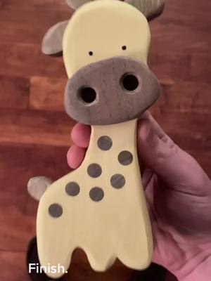 A post by @shelbyhahn500turns on TikTok caption: Giraffe. Fun. #giraffe #woodentoys #woodwork #woodworking #fyp #fyp #foryourpage #asmr #handmade