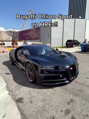 A post by @lacarspotter on TikTok caption: How much do you think this car costs? #bugatti #chiron #bugattichiron #cars #hypercar #baller #blackonblack #rims #foryou #walkaround #thick #thicktok