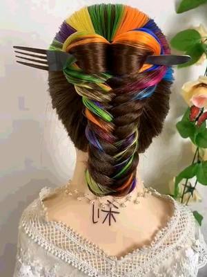 A post by @hairstylelovers171 on TikTok caption: Braid your hair with a fork. 😲 #longhair #longhairstyle #hairstyles #fyp #braid