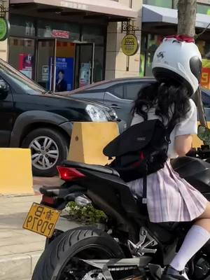 A post by @sarah.bibber on TikTok caption: The cutest girl riding the coolest motorcycle#biker #biker #rider #motogirl #motorcycle #fyp #foryou