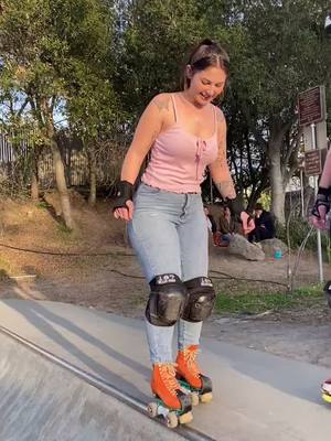 A post by @catsk8s on TikTok caption: such a good day! 50/50 fakie drop ins unlocked :) #rollerskating  #DontSweatIt #skatepark #moxirollerskates #wildbonesliders