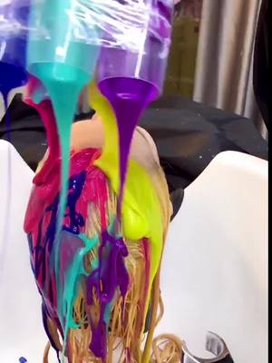 A post by @fleesse.advolla644 on TikTok caption: Rainbow hair color#hairstyles #fashion #fyp #foryou