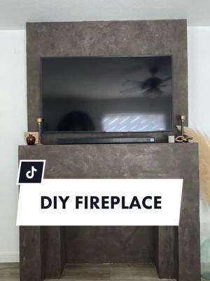 A post by @artandstef on TikTok caption: ok ok last one. faux fireplace using Roman clay 🤎 #diyhomedecor #diyprojects #remodel #fireplacemakeover #fyp