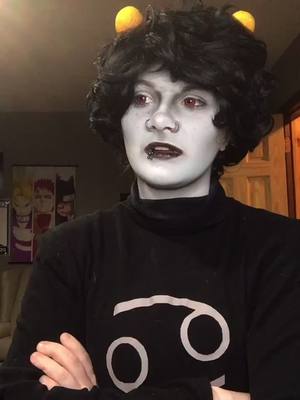 A post by @blackrosesmoothie on TikTok caption: who’s this about? too many options, pick one yourself #karkatvantas #homestuck #betatrolls #karkat