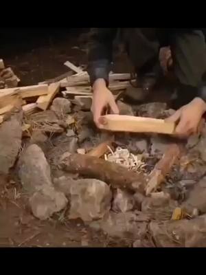 A post by @survivalhacks on TikTok caption: How to make a camp fire in a couple of seconds🔥🏕 #campfire #survivalskills #survivalist #survivalmode #firemaking #camping #wood