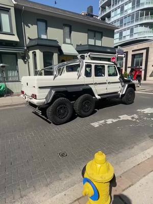 A post by @spexdealer on TikTok caption: Worth 2 MILLION? Anybody know the owners @? #yorkville #toronto #yorkvilletoronto #gwagon #g63 #4x42 #million #montanaplate