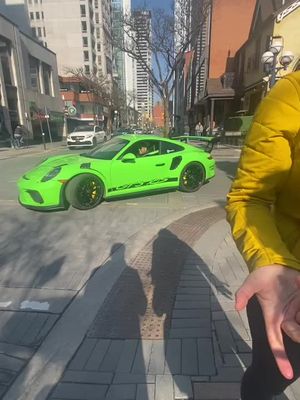 A post by @spexdealer on TikTok caption: Always a neck breaker. @fullsend #yorkville #toronto #yorkvilletoronto #carspotter #canada #gt3rs #gt3 #porsche #green